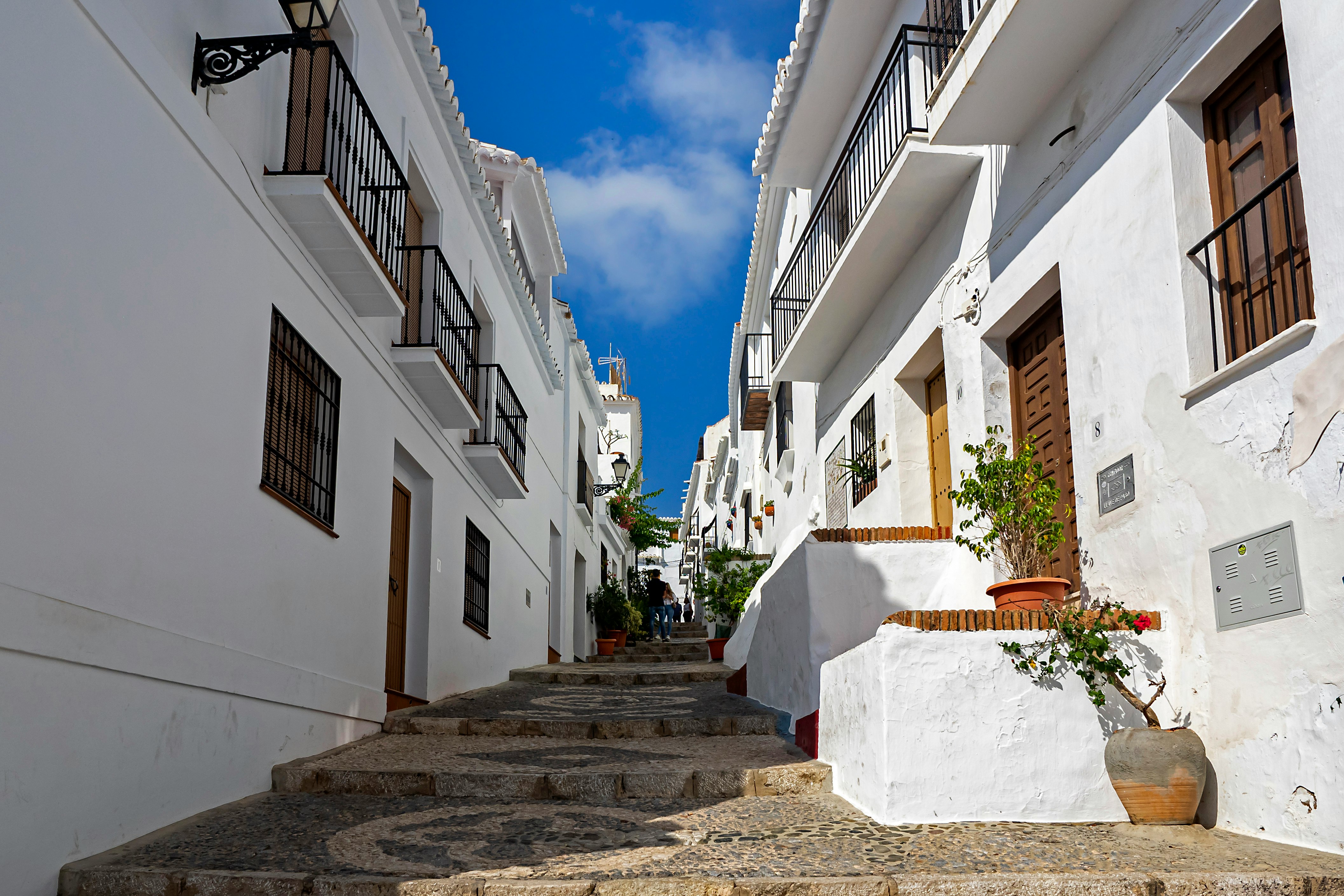 white concrete building under blue sky during daytime